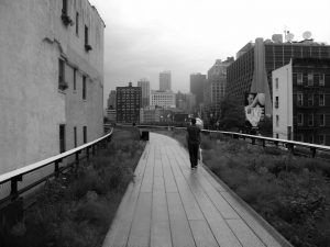 People walking in Highline park on a rainy day